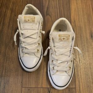 White Converse with gold stars